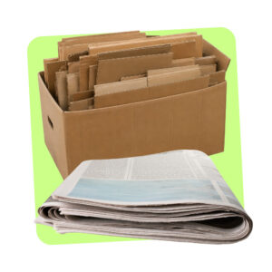 an empty cardboard box filled with other flattened cardboard boxes and a stack of newspapers